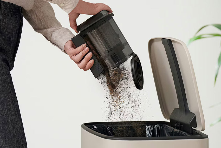 Opróżnianie pojemnika na kurz Twist2open w Miele HX3 Aqua bez kontaktu z zabrudzeniami