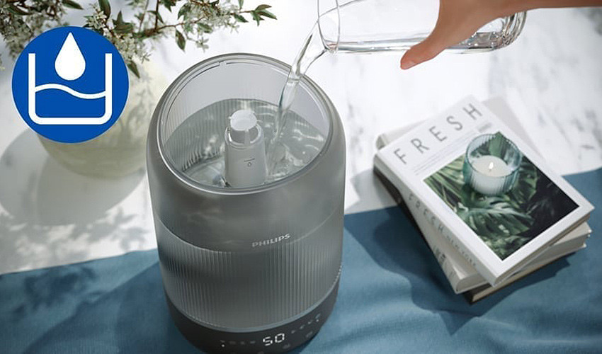 nalewanie wody do zbiornika Philips HU1510/03