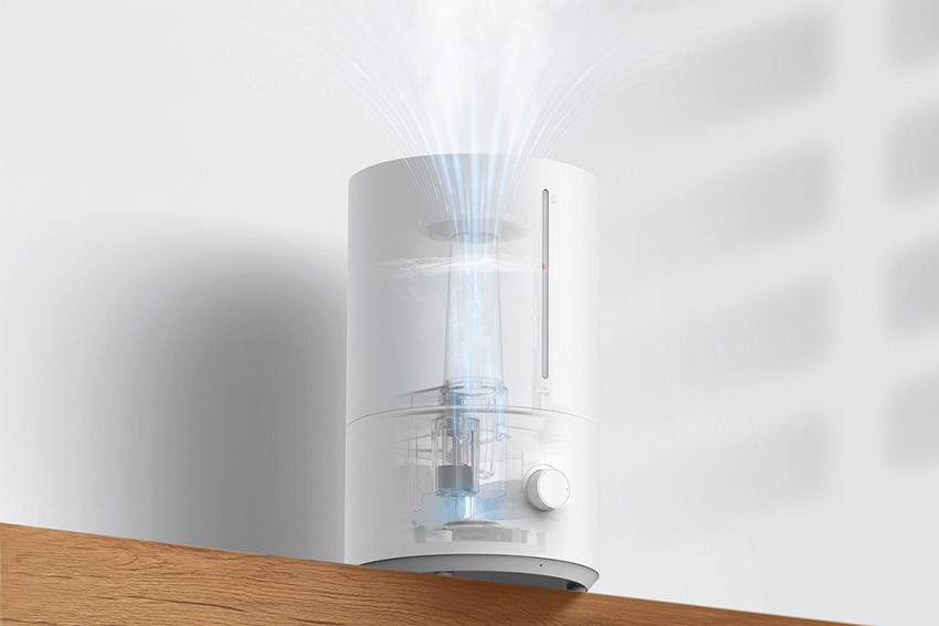 Przekrój Xiaomi Smart Humidifier 2 Lite z wodą w zbiorniku i mgiełką nad wylotem