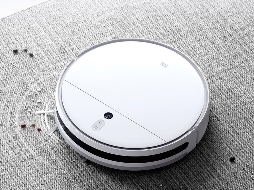 Robot sprzątający Xiaomi odkurza dywan