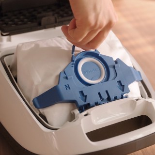 Wymiana worka w odkurzaczu Miele